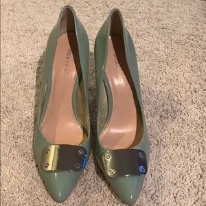 Sole society pumps with metallic detail